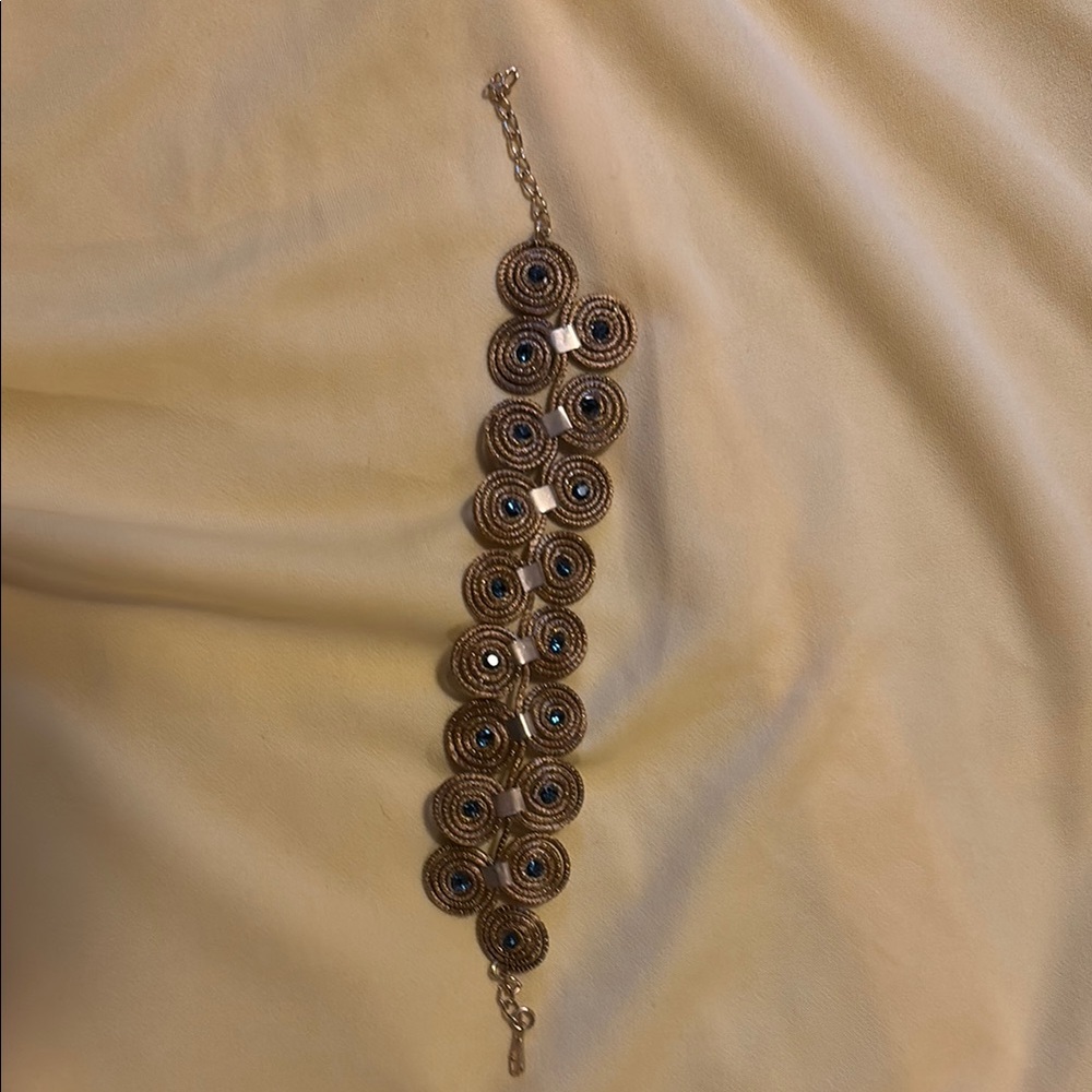 Elegant Gold and Brown Spiral Bracelet